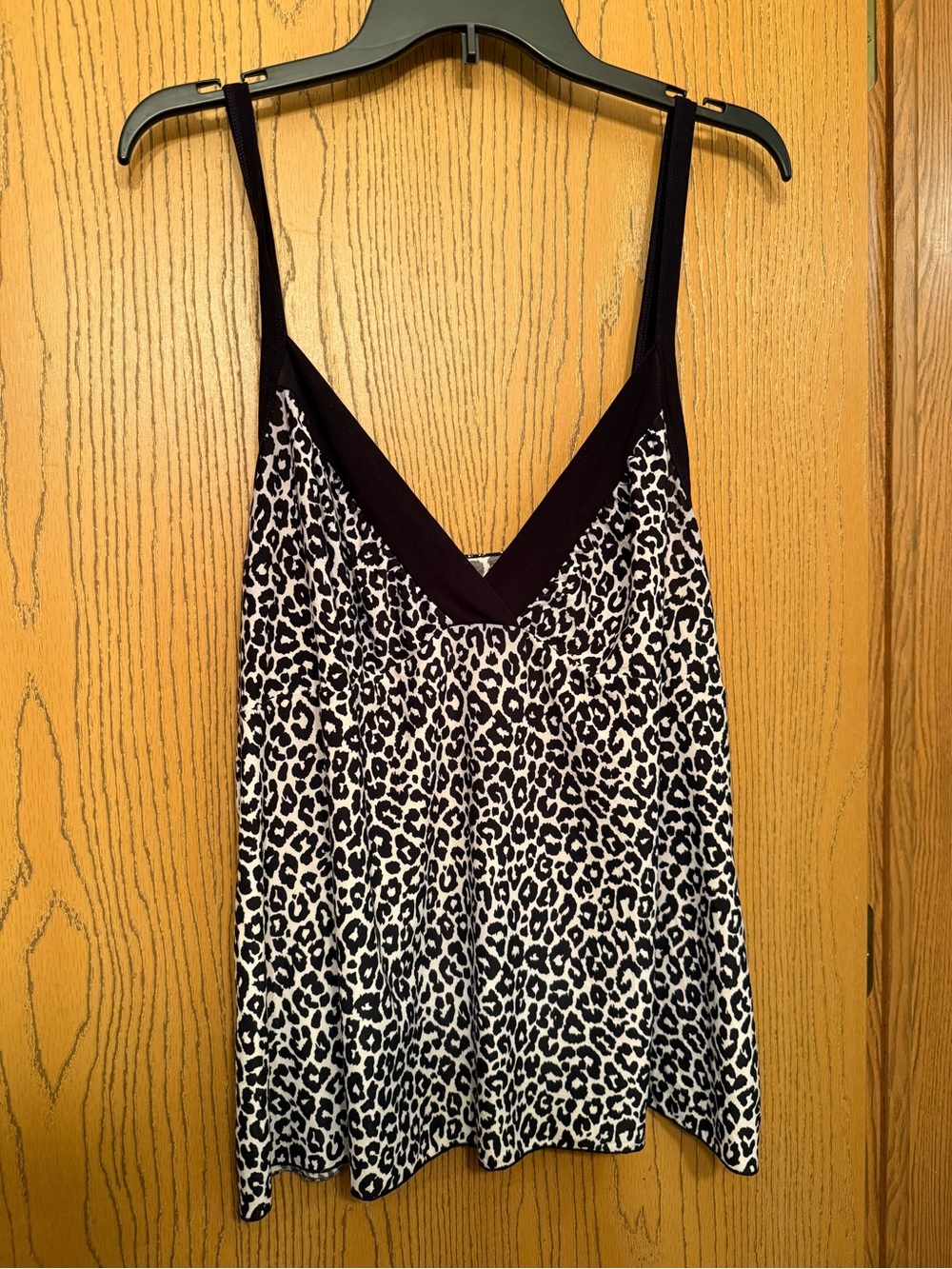 Secret Treasures size 2 XL spaghetti strap top. Black and white cheetah print.